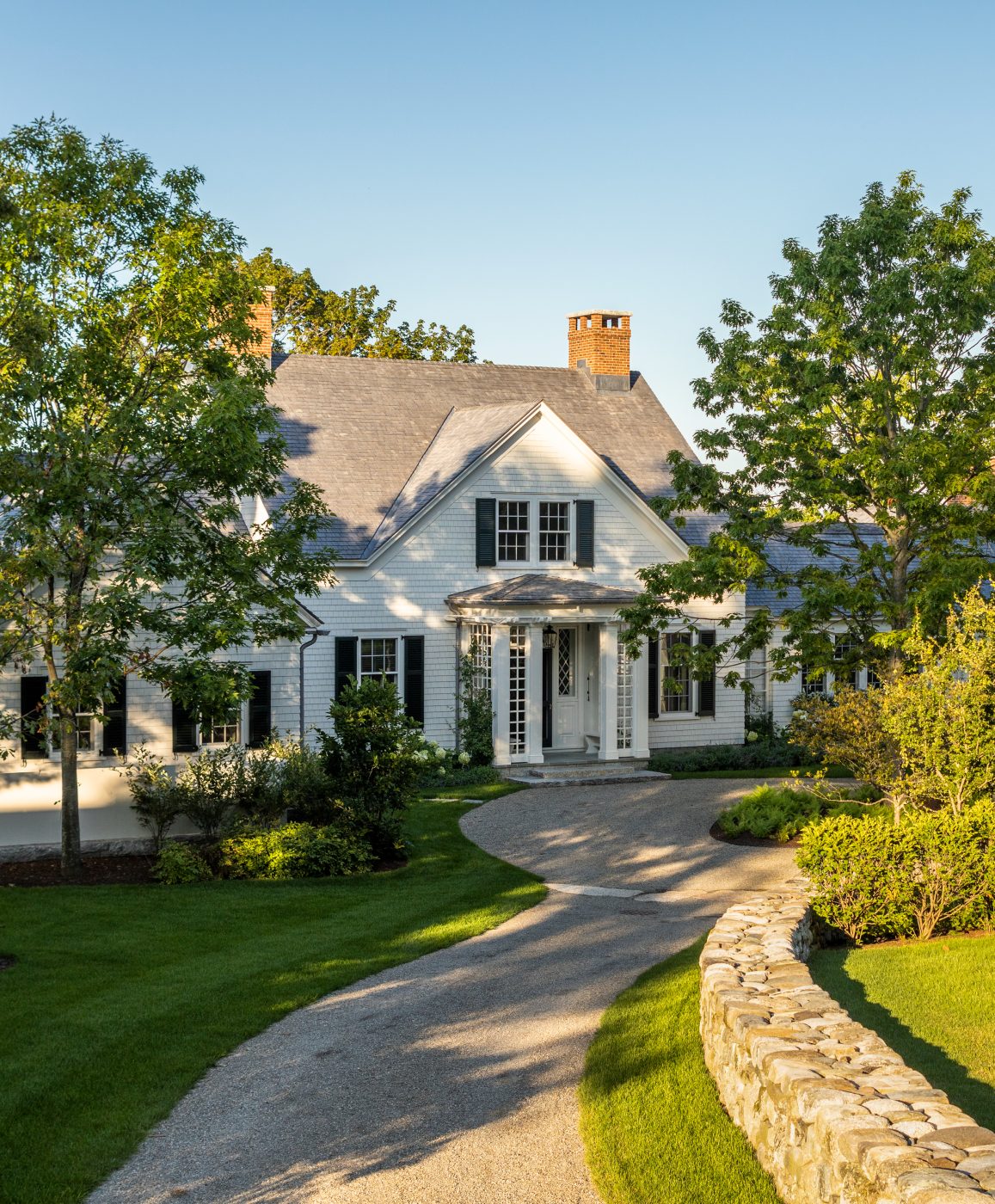 Modest white shingle home in Downeast Maine by Gil Schafer III in his new book Home at Last: Enduring Design for the New American Home Rizzoli publisher written with Mark Kristal