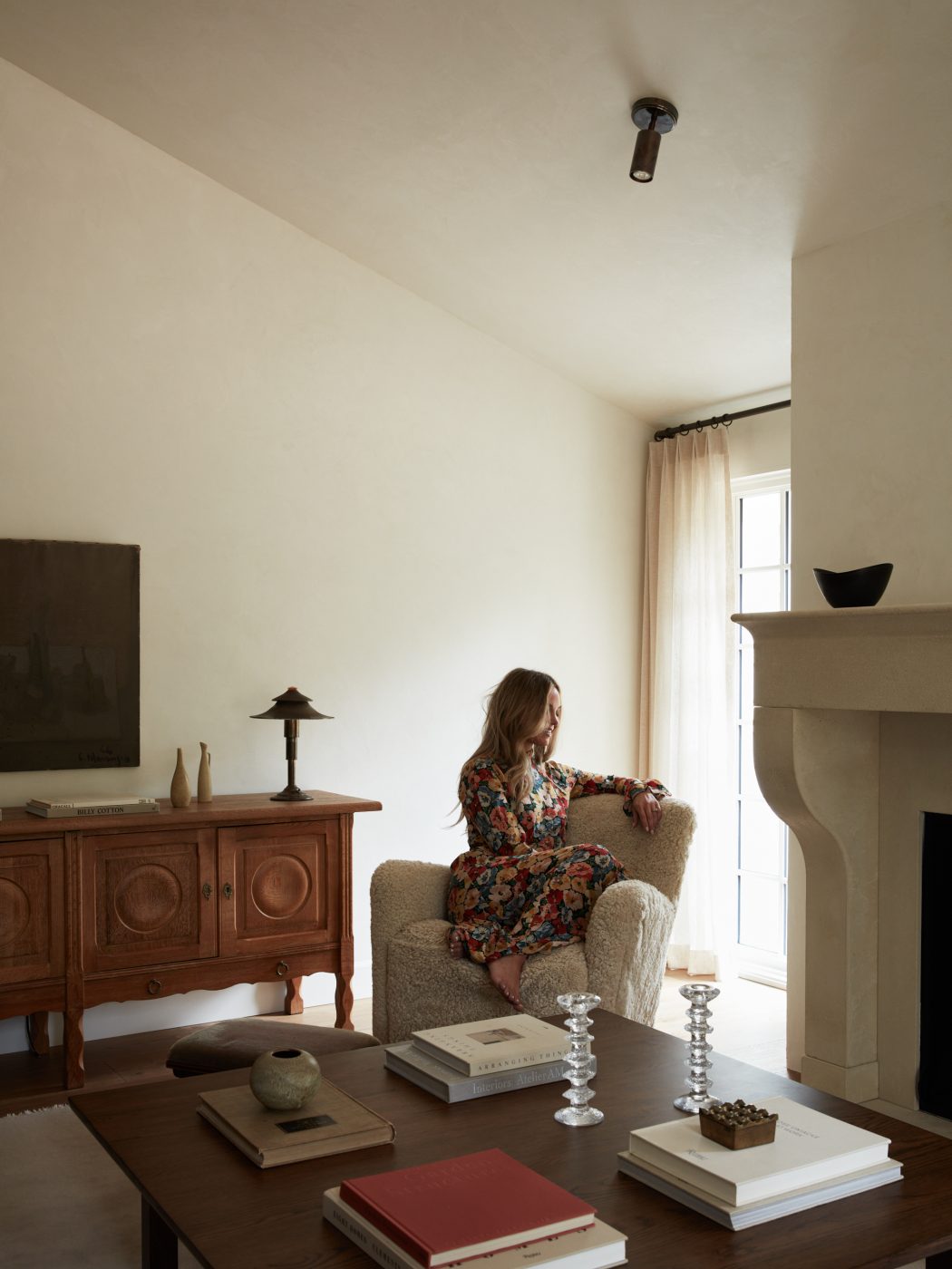 Interior designer Molly Beth Kidd photographed in the living room of her Oregon Home
