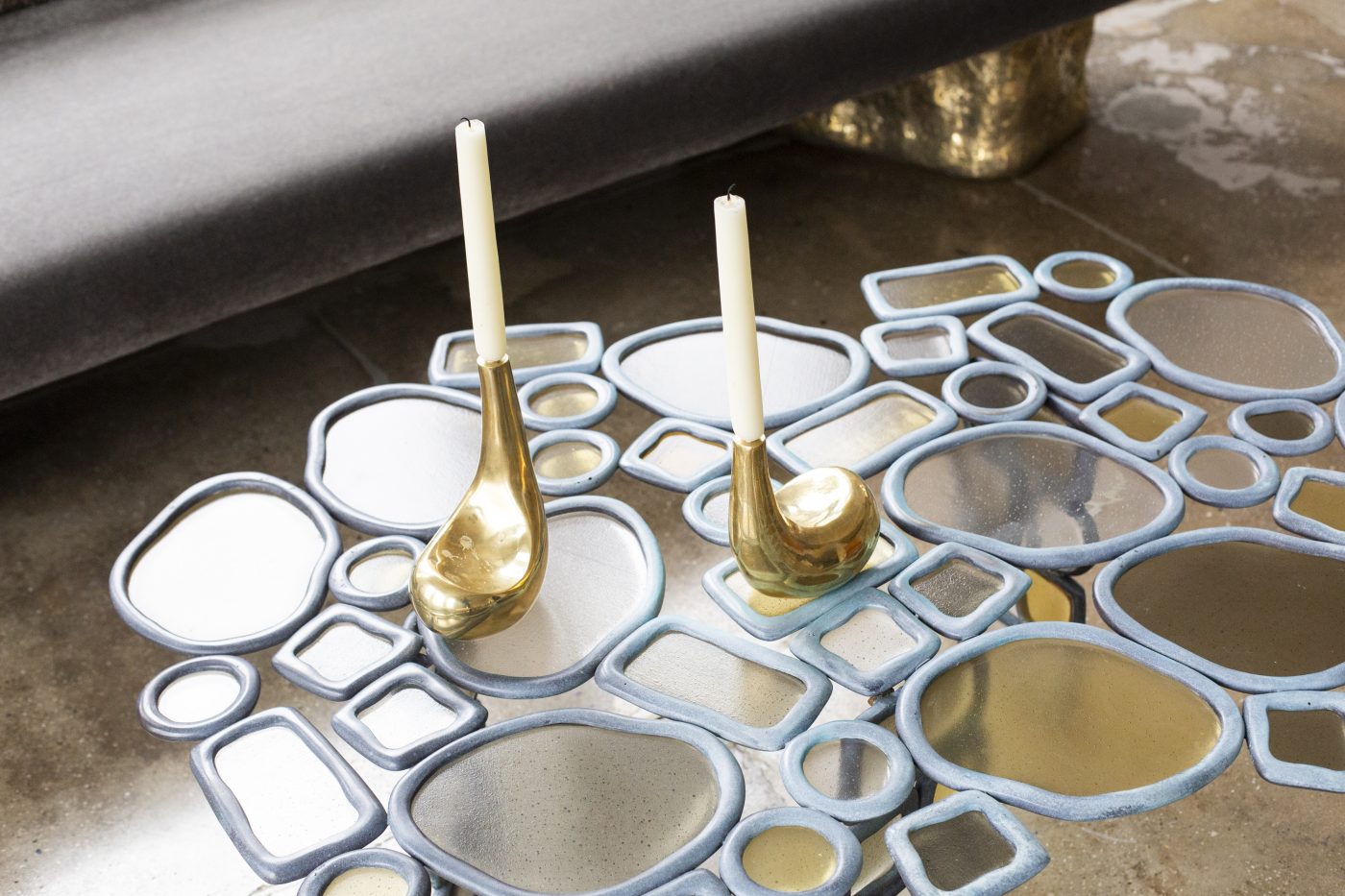 Lucas Recchia’s bronze candlesticks and Material Distortion coffee table at Bossa Furniture