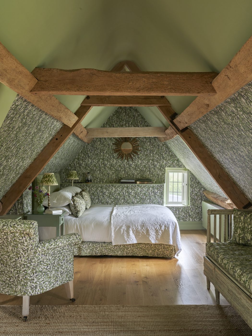 The bedroom of the Rivermint suite at the Thyme countryside hotel and estate in England's Cotswolds 