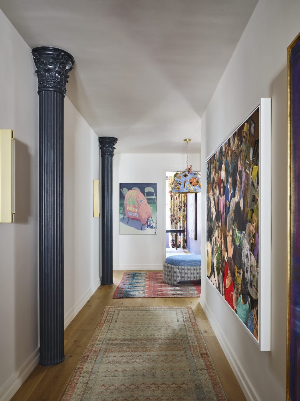 In the hall of a Tribeca loft designed by Kati Curtis hangs a whimsical ceramic pendant lamp by Katie Stout, found at R & Company, above an ottoman by Randolph & Hein covered in a Christopher Farr fabric. artwork by Alex Dodge Alex Prager.