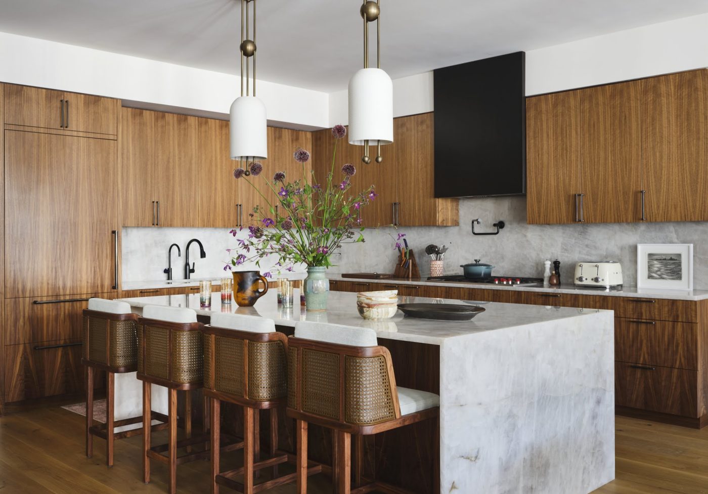 Walnut cabinet clad kitchen in Tribeca loft Interior by designer Kati Curtis