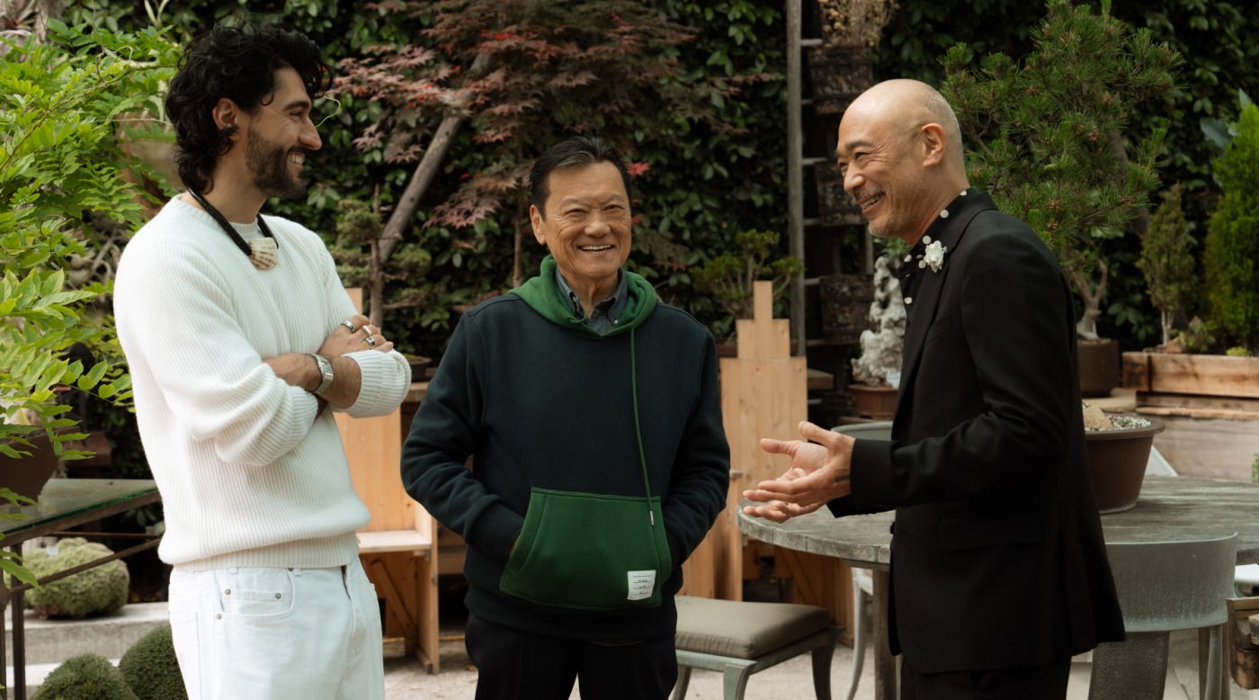 Interior designers Giampiero Tagliaferri, left, and Cliff Fong, right, chat with Joel Chen outdoors at his design gallery JF Chen