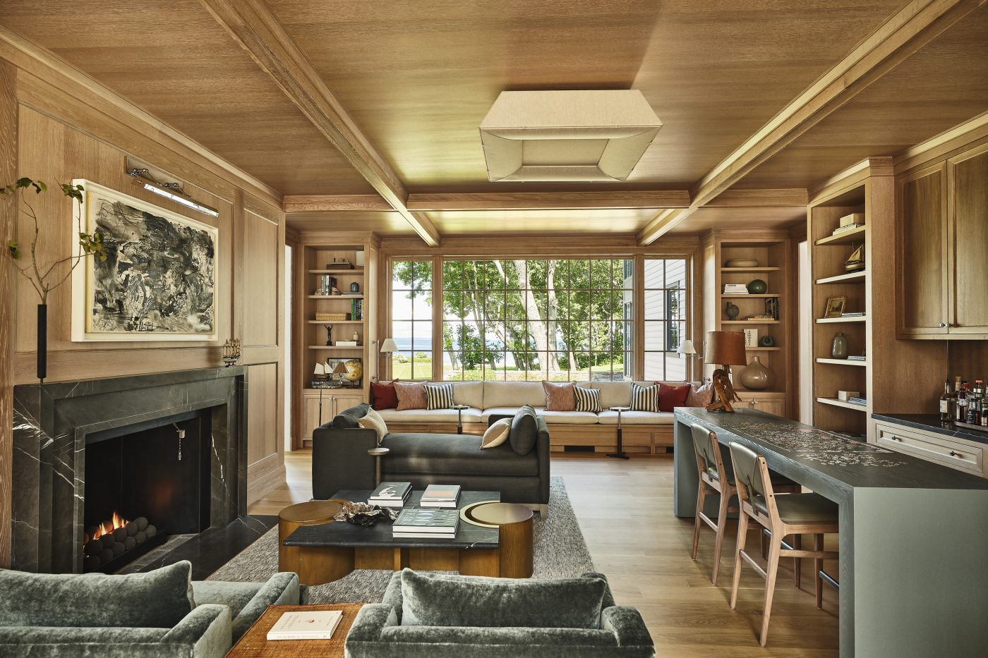 Lounge and bar of a Maine coast home designed by Gray Davis and Will Meyer of the studio Meyer Davis