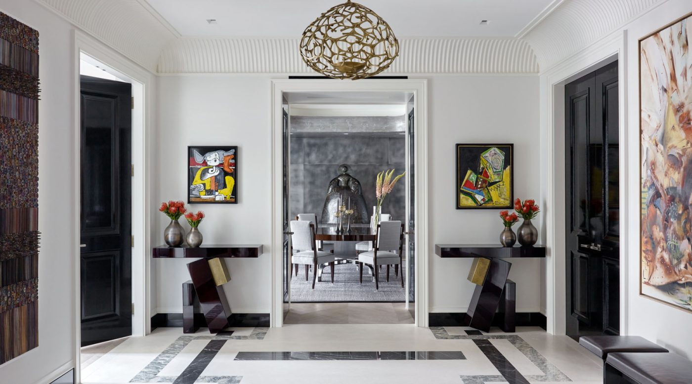 Art-filled entry gallery of Fifth Avenue Manhattan apartment designed by David Kleinberg