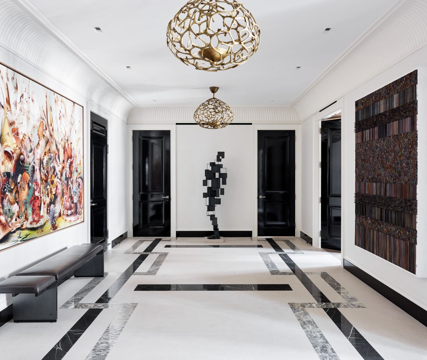 Art-filled entry gallery of Fifth Avenue Manhattan apartment designed by David Kleinberg