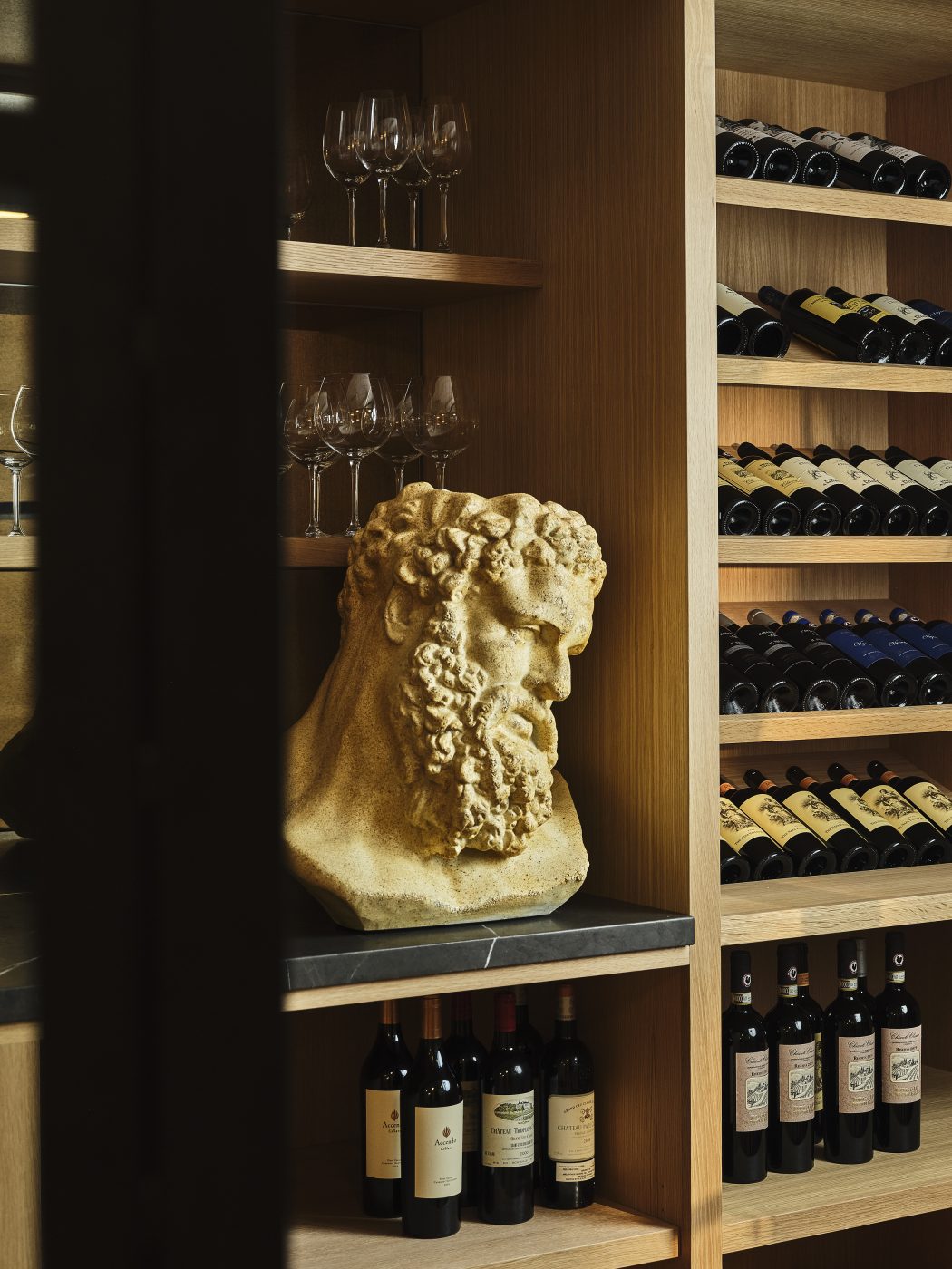 Wine cave of a Maine coast home designed by Gray Davis and Will Meyer of the studio Meyer Davis