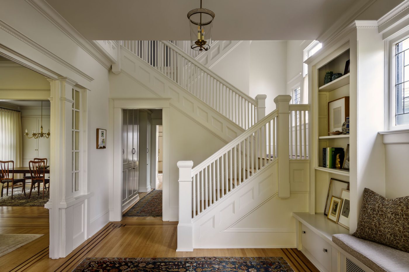 Entryway with stair hall in a house in Seattle's Capitol Hill neighborhood designed by Lisa Staton