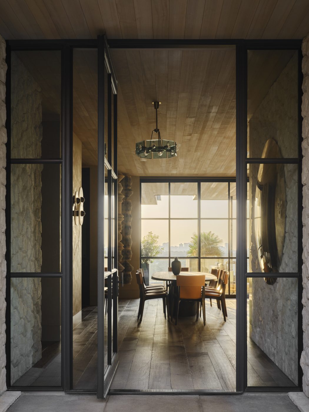 Dining room of a home on the shores of Texas's Lake Austin designed by architect Ryan Street and interior designer Jennifer Sissom