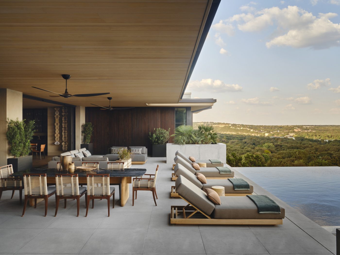 Pool terrace of a home on the shores of Texas's Lake Austin designed by architect Ryan Street and interior designer Jennifer Sissom