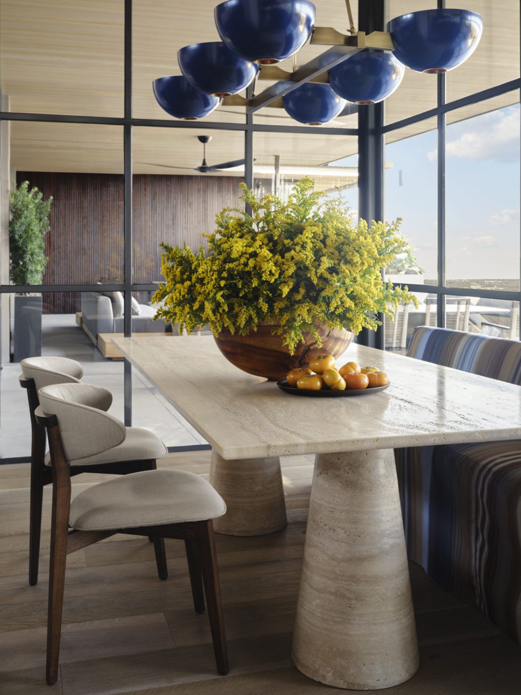 Kitchen dining nook of a home on the shores of Texas's Lake Austin designed by architect Ryan Street and interior designer Jennifer Sissom