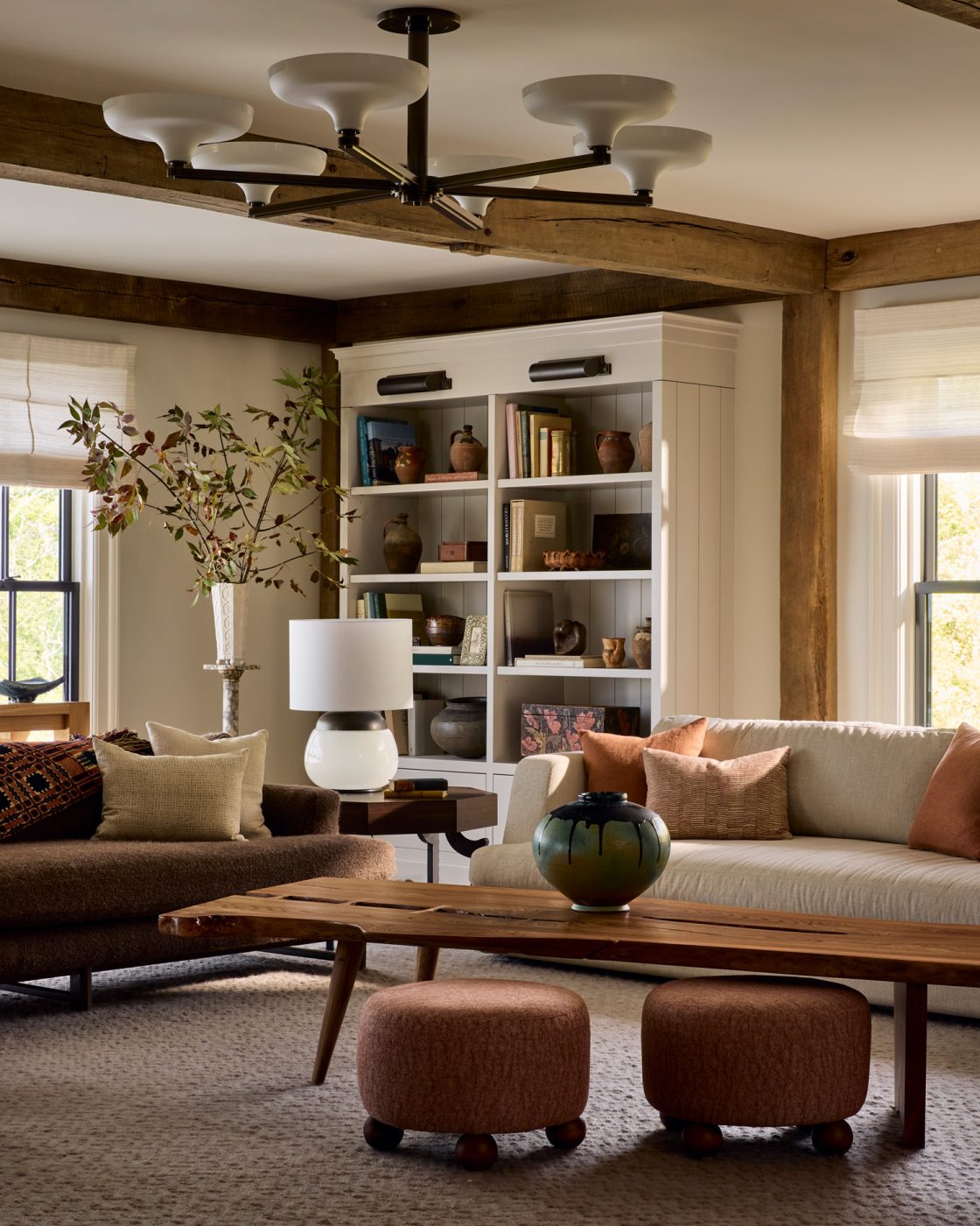 Returning to the great room, an over-scale six-arm pendant by The Urban Electric Co. makes a statement overhead.