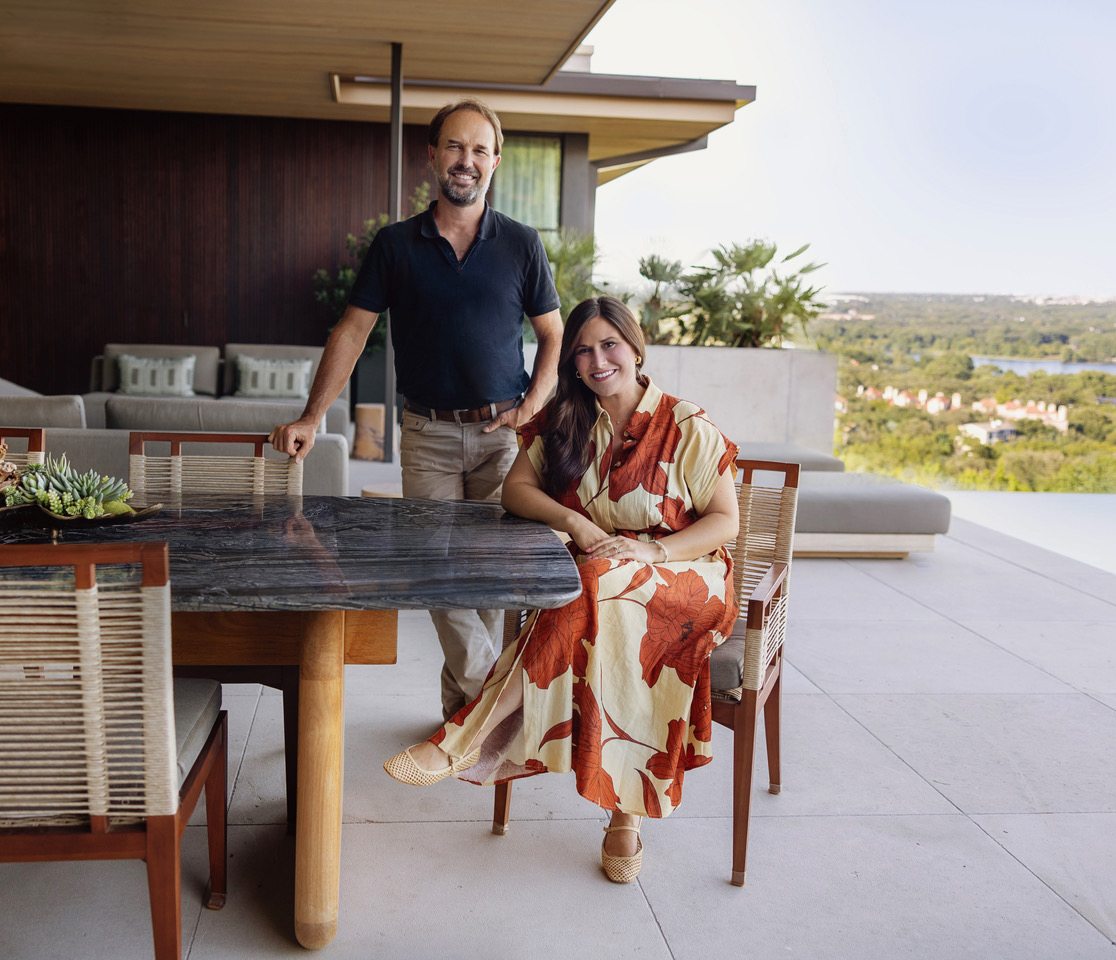 Portrait of architect Ryan Street and interior designer Jennifer Sissom on the pool patio of a home the designed on the shores of Lake Austin in Texas