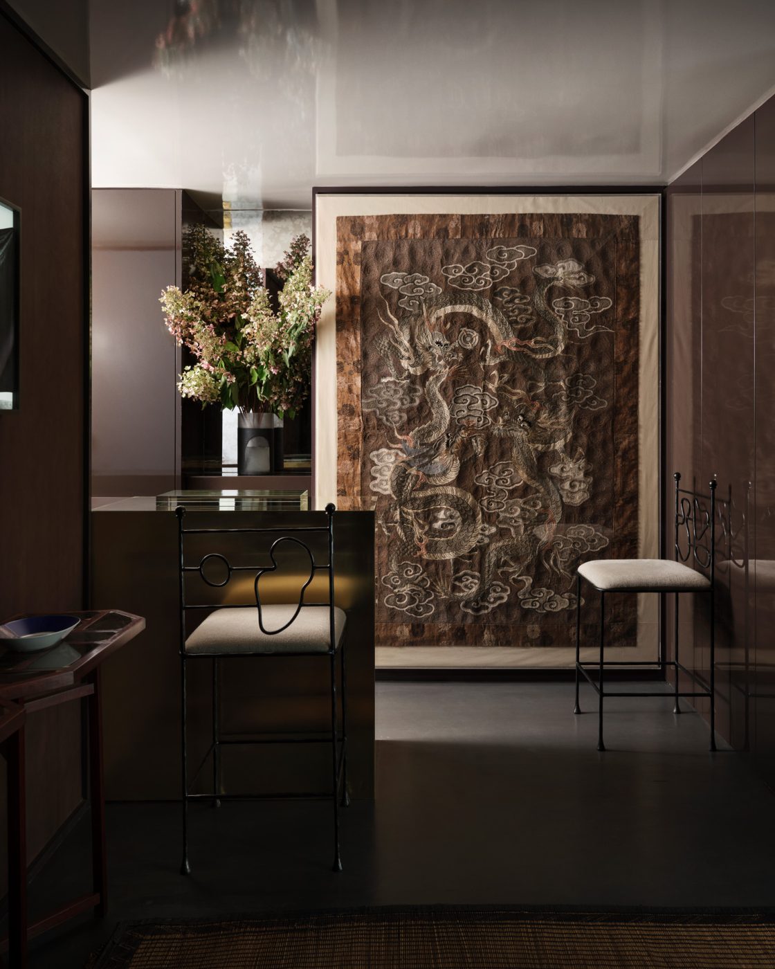 Olivia Williams top-floor studio apartment in the Kips Bay Decorator Show House New York 2025 kitchen with Rug & Kilim embroidered wall hanging