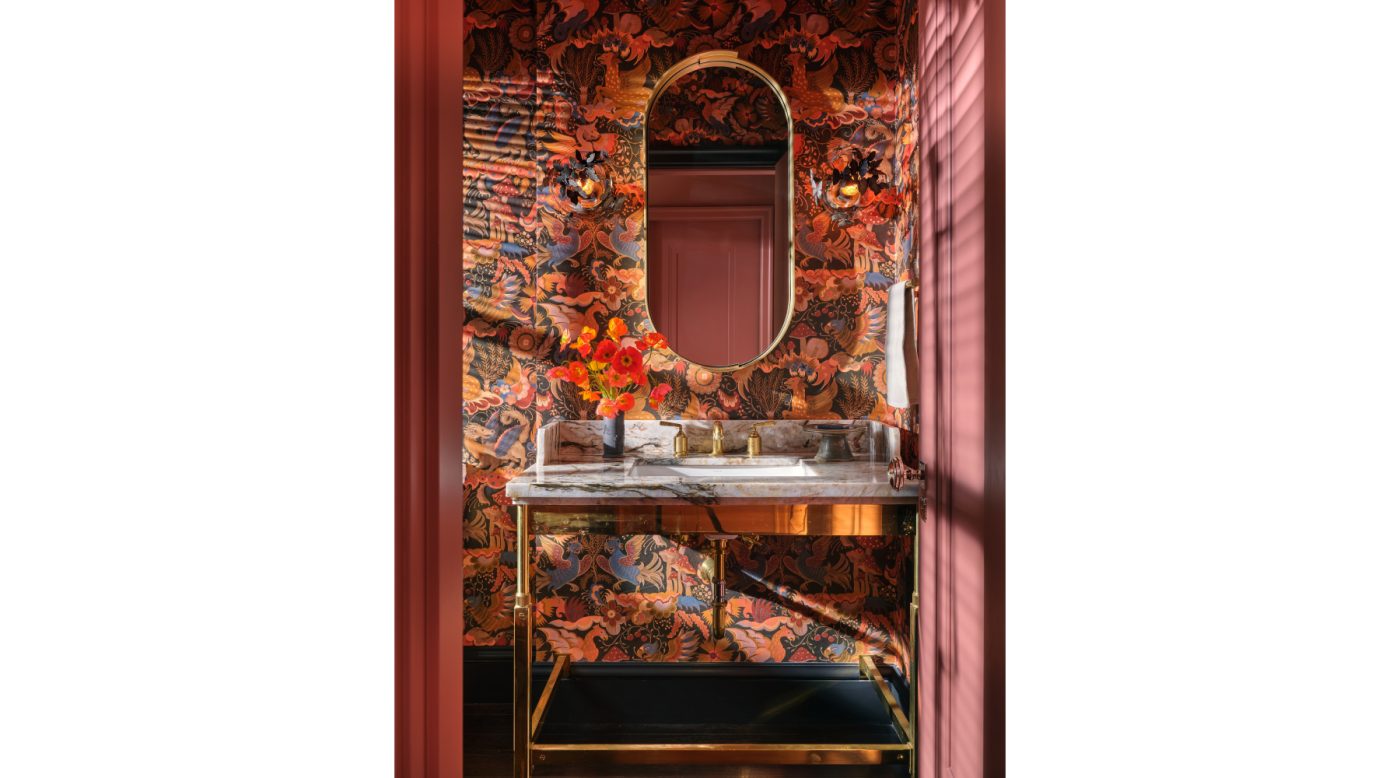 Pink wallpapered bathroom powderoom room off the den in Edwardian house San Francisco's Pacific Heights with interiors by Brittany Giannone's ABD STUDIO