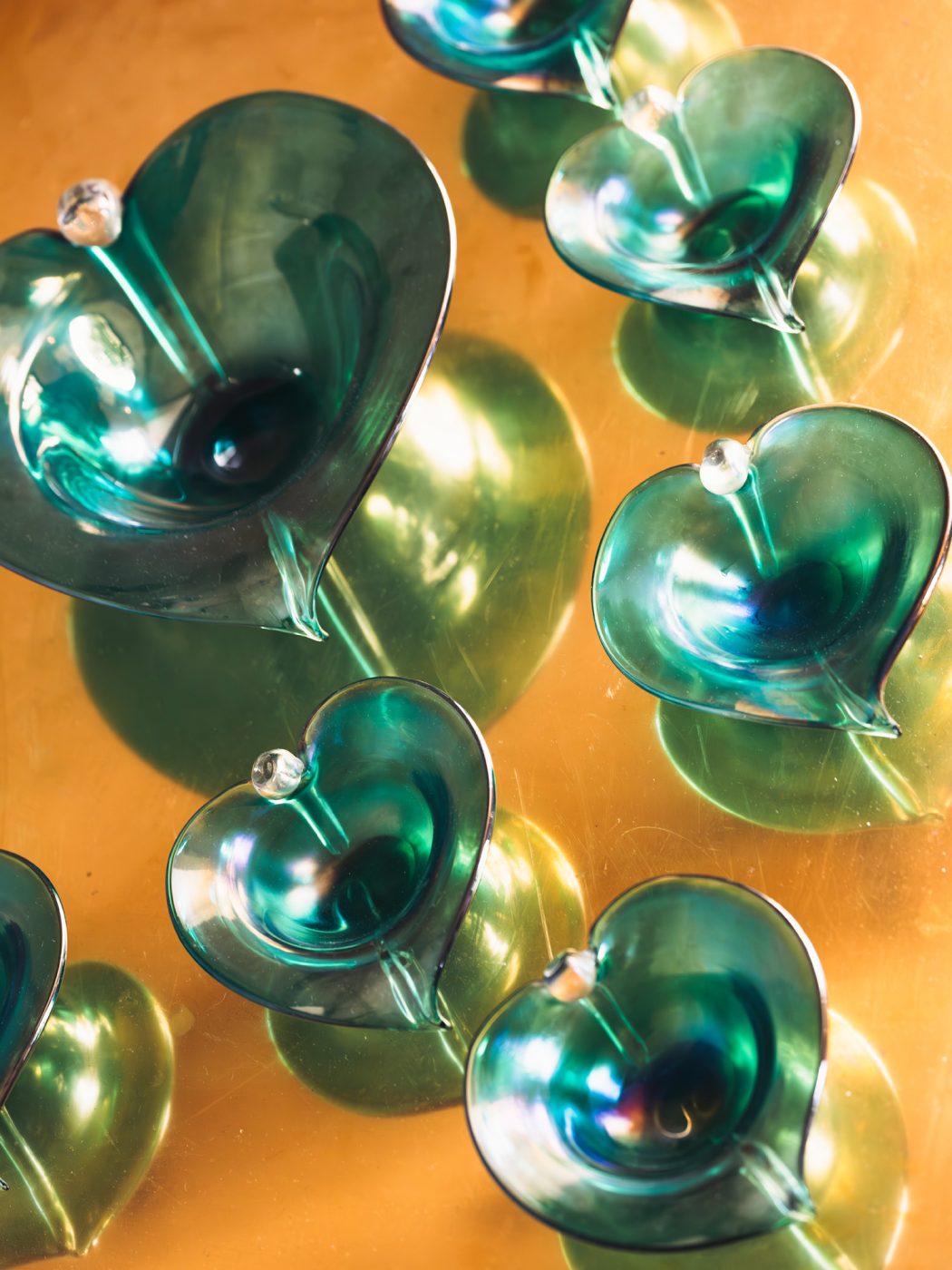 aquamarine-colored Murano glass bowls and cups by Alfredo Barbini at the Italian Collector, the Florence Italy shop of antiques dealer Bec Astley Clarke