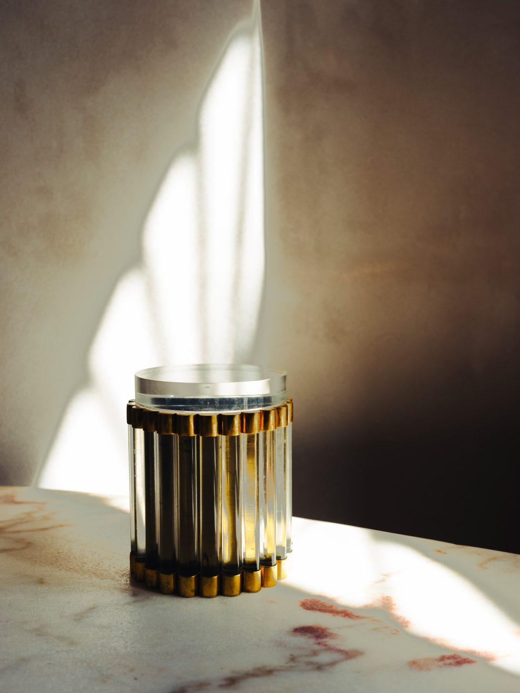 A cylindrical Plexiglass-and-Glass pot by Gabriella Crespi at the Italian Collector, the Florence Italy shop of antiques dealer Bec Astley Clarke