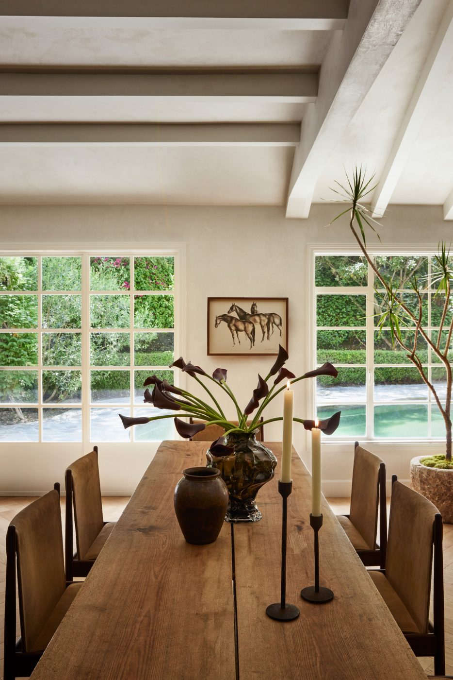 Dining area in Beverly Hills home designed by Maggie Smith with Eneby Home dining table and Sergio Rodrigues chairs