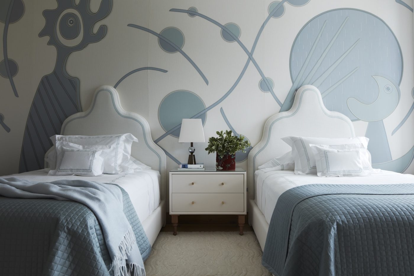 Twin bed Miro guest room — so named for Joan Miro-inspired wall covering — of West Palm Beach house with architecture by Daniel Kahan of Smith and Moore Architectures and interiors by Caroline Rafferty
