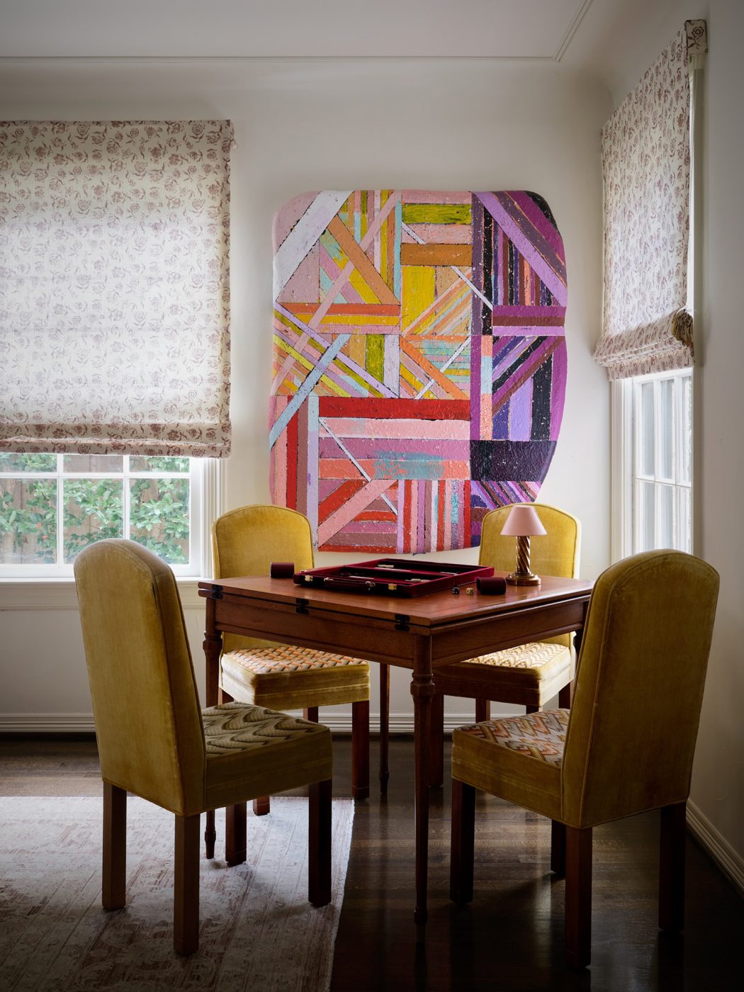 Games table corner of the living room of a Spanish Colonial house in Highland PArk Village Dallas designed by Dafna Kikuchi of Daf&Co