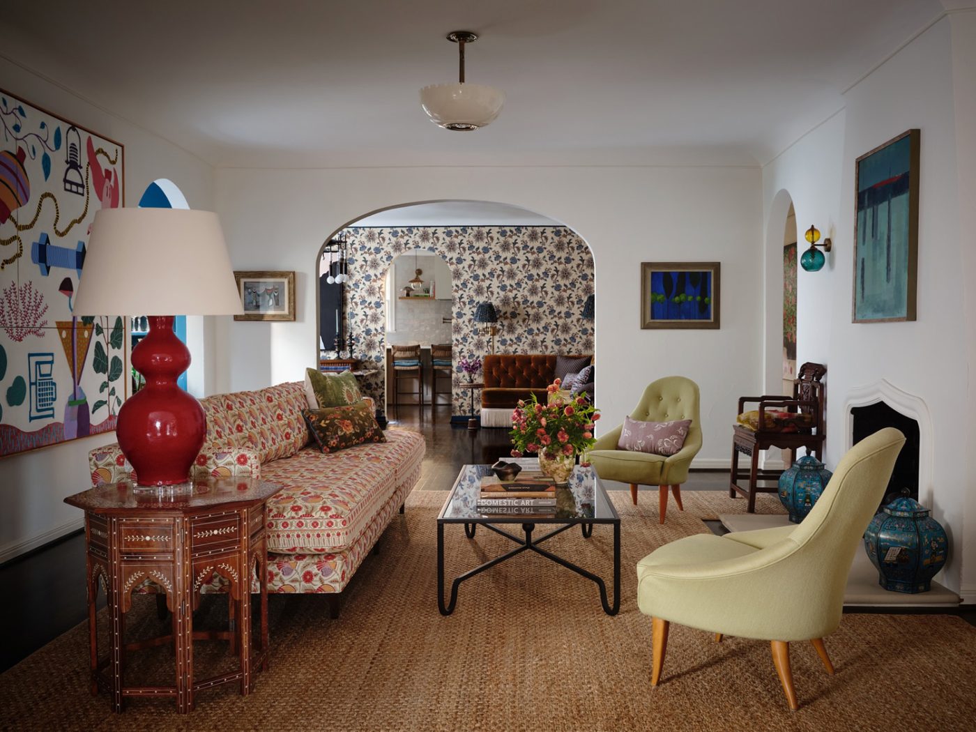 living room with view to dining room and kitchen in a Spanish Colonial house in Highland PArk Village Dallas designed by Dafna Kikuchi of Daf&Co