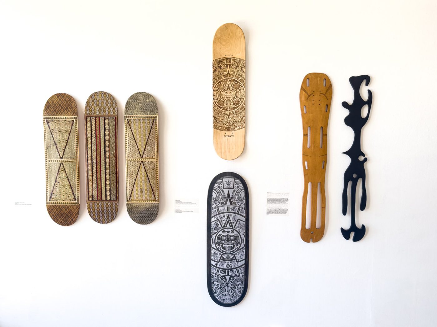 Skateboard art by Leila Nazarian, Manny Torres and Neil Stratton in “Vehicles of Expression: The Craft of the Skateboard.”