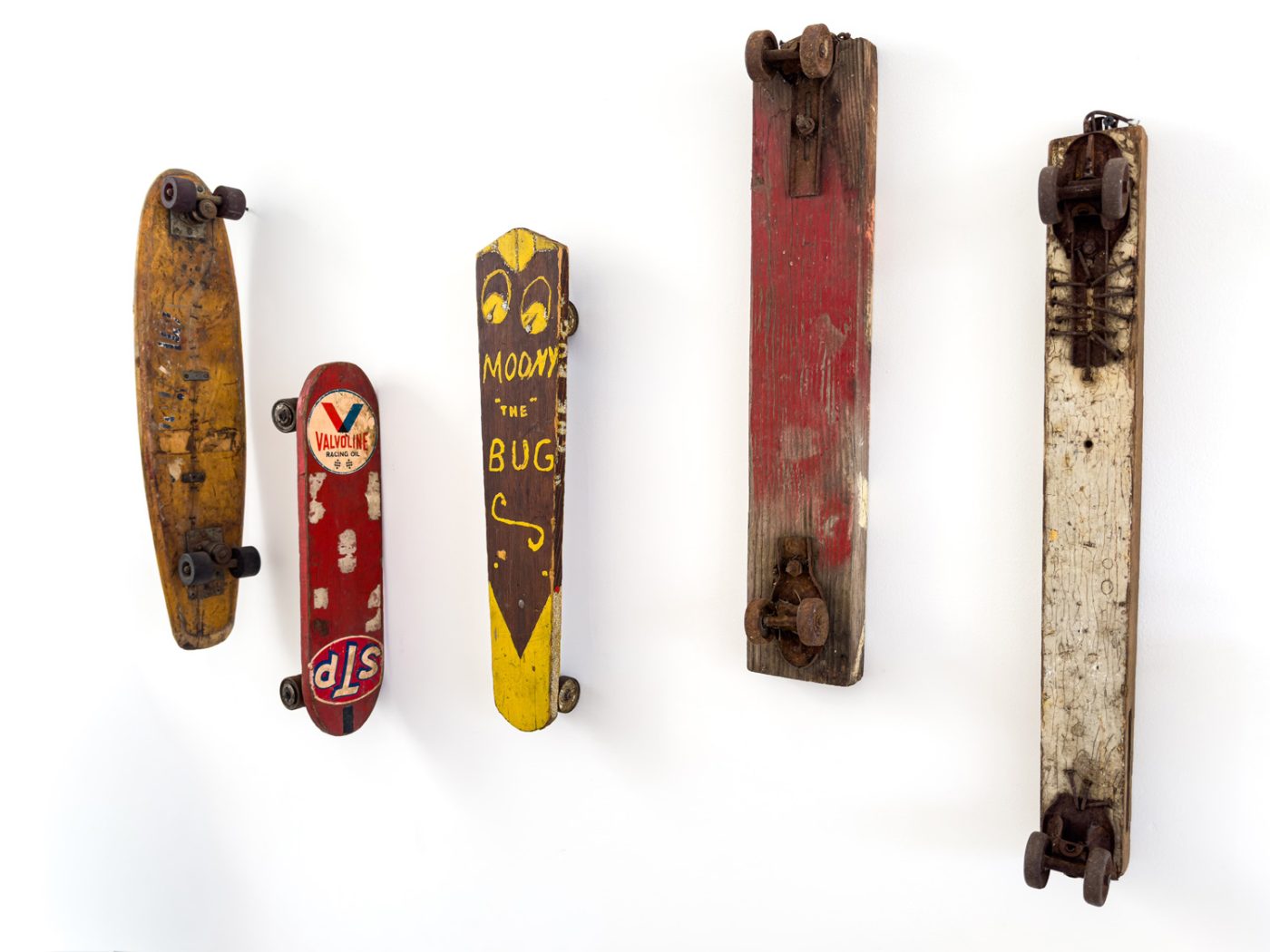 Vintage homemade skateboards on view in “Vehicles of Expression: The Craft of the Skateboard,” at the Craft in America Center in Los Angele