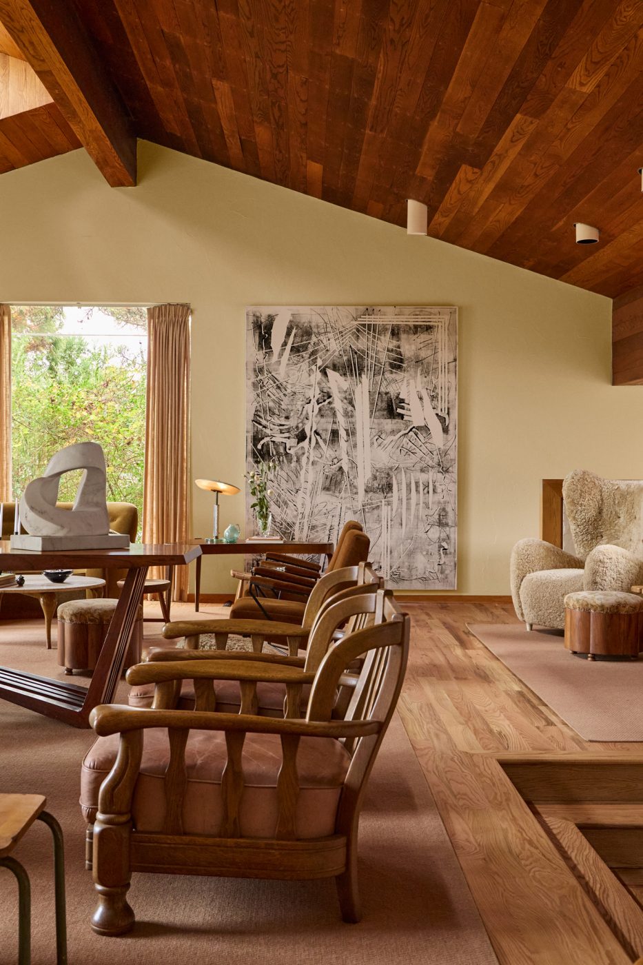 Living room of 1970s-era home in the Emeryville neighborhood of High Point North Carolina owned by husband and wife Michael Radziewicz and Jennifer Ponce, of the mid-century-modern furniture gallery PRB Collection