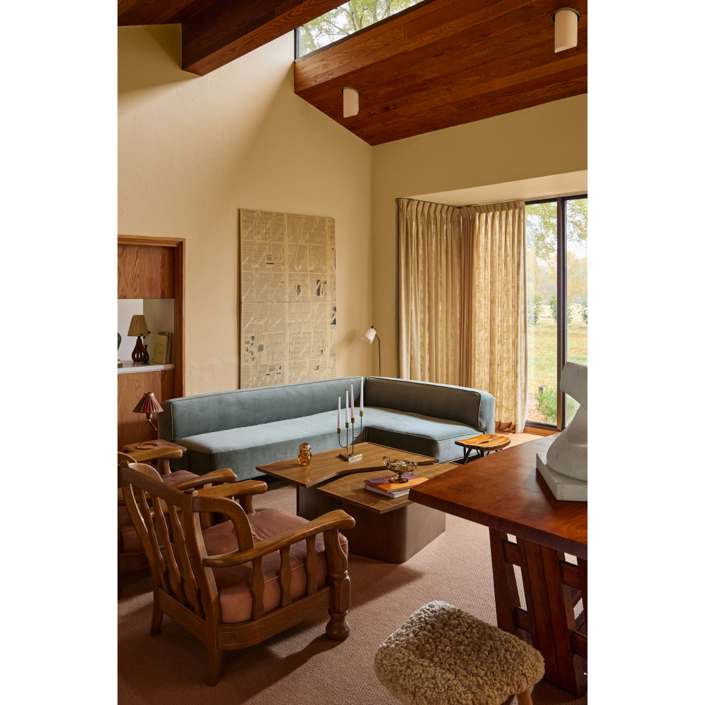 Living room of 1970s-era home in the Emeryville neighborhood of High Point North Carolina owned by husband and wife Michael Radziewicz and Jennifer Ponce, of the mid-century-modern furniture gallery PRB Collection