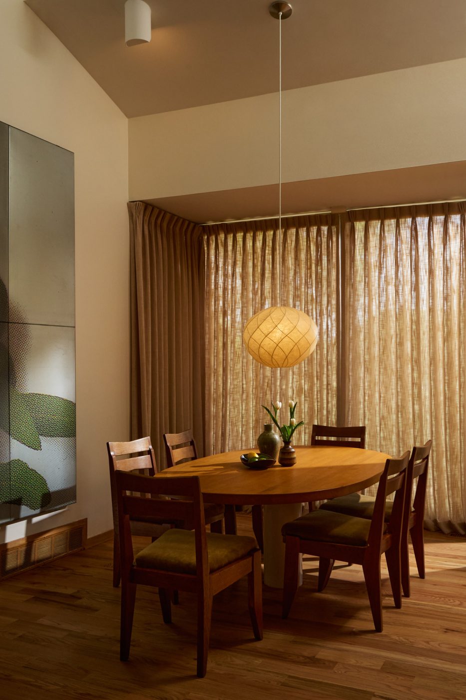Dining room of 1970s-era home in the Emeryville neighborhood of High Point North Carolina owned by husband and wife Michael Radziewicz and Jennifer Ponce, of the mid-century-modern furniture gallery PRB Collection