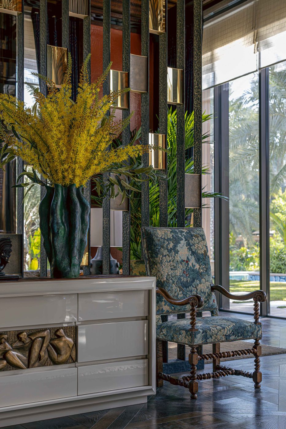 Louis XIII chair in the grand salon of the entertaining pavilion on a large compound in Saudi Arabia by Jacques Bec and Artur Miranda's architecture and design studio Oitoemponto