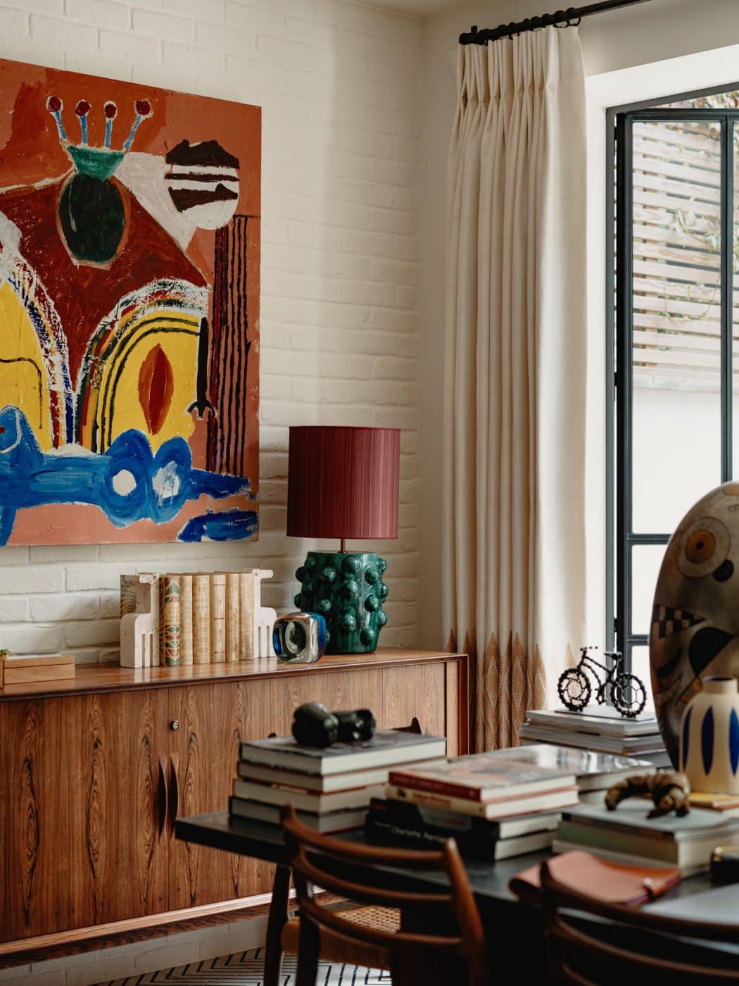 Dining area in the apartment in London's Kensington owned and decorated by Romanos Brihi, co-founder of the London interior design firm Studio Vero