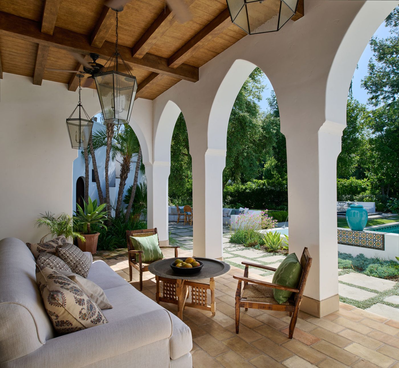 Loggia seating outside a California Spanish Revival house by Ohara Davies-Gaetano and Michael G. Imber