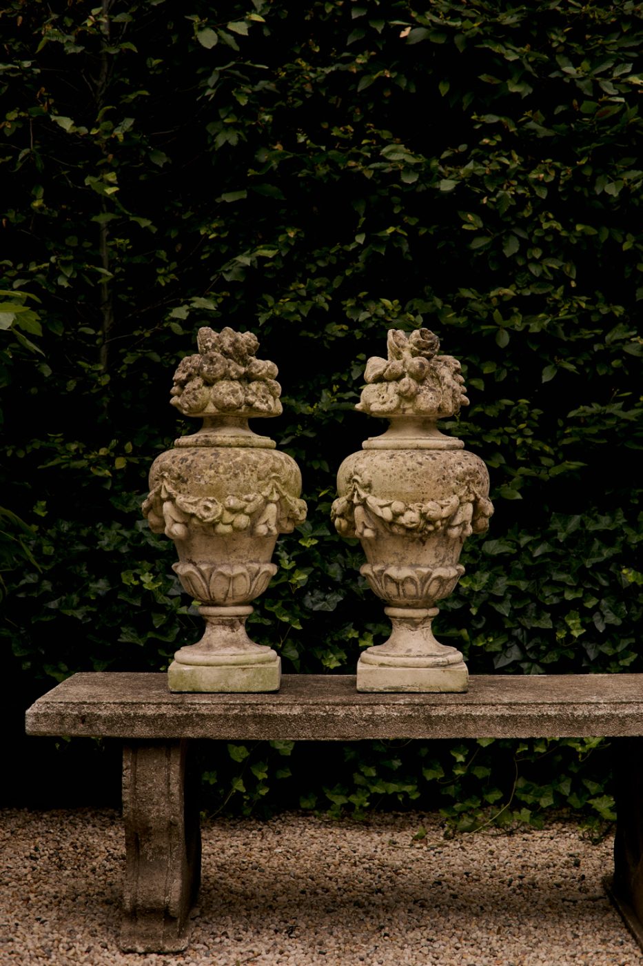 On offer by the gallery Galerie Green are a bust, cast in resin and inspired by antiquity and a bluestone-topped scroll-leg table