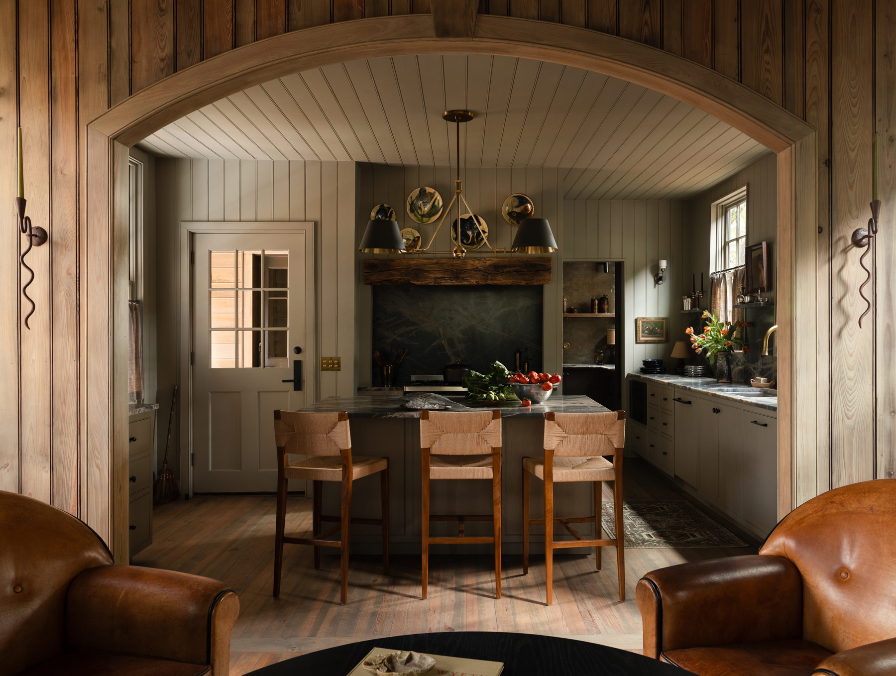 Kitchen of a former agrarian building on South Carolina's Edisto Island reimagined as a vacation home by interior designer Sean Anderson and architect Will Wingfield